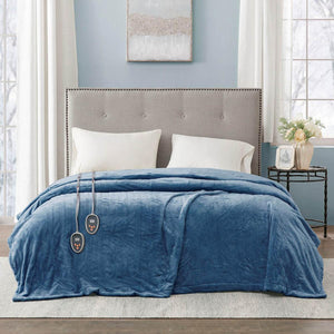 Beautyrest blue electric heated blanket on a bed with two controllers