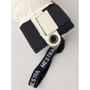 Hestra glove cuff with white leather and black fabric strap