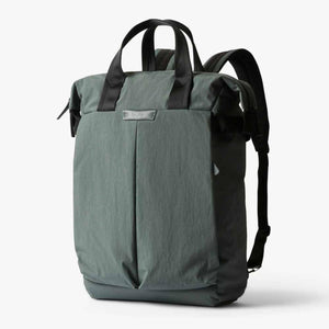 Bellroy green tote backpack with black carry handles and shoulder straps