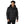 Man wearing a black Helly Hansen hooded puffer jacket