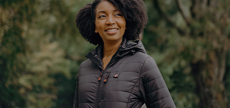 Woman wearing heated jacket - shop heated gear for women