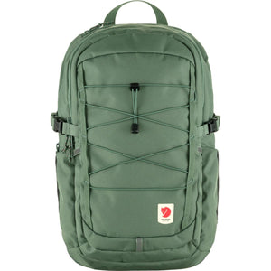 Fjallraven green backpack with front bungee cord system and side compression straps