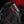 Close up of black Hotronic heated glove with textured fabric and leather details