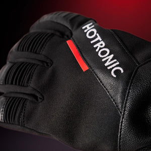 Close up of black Hotronic heated glove with textured fabric and leather details