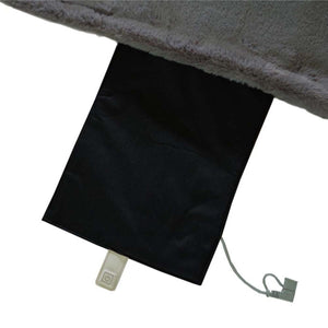 Grey faux fur heated blanket with black control panel and power cord