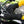 Warm and Safe black leather motorcycle gloves on handlebars