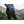 Person wearing black FjallRaven trousers with zippered pockets in a mountain landscape