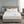 Serta heated mattress pad on a bed with two controllers