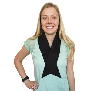 Woman wearing a black neck scarf over a light green t-shirt