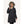 Woman wearing a black FNDN heated parka with a faux fur hood