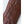 Brown Hestra leather glove showing decorative stitching on the back