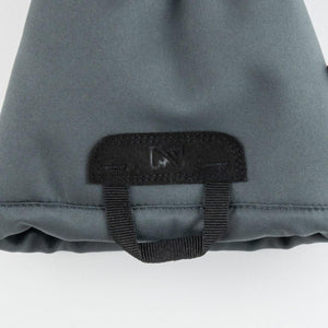 Mobile Warming grey fabric cuff with black pull tab and logo patch