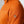 Close up of orange FjallRaven grid fleece fabric with branded logo patch on sleeve