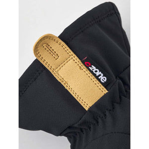 Hestra black glove cuff with tan leather pull tab and CZone logo tag