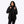 Woman wearing a black Mobile Warming hooded jacket with a quilted inner layer