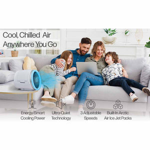 Ontel portable air cooler on a table with a family sitting on a sofa in the background