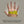Hand being measured with a yellow tape measure to determine glove size