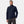 Man wearing a navy Helly Hansen softshell jacket with a full zip and chest pocket