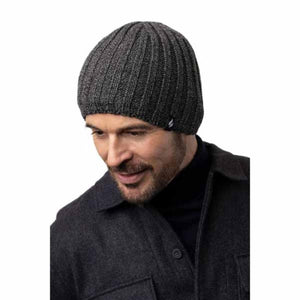 Man wearing a dark grey ribbed knit beanie