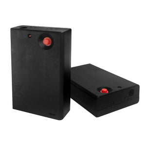 Two rectangular black battery packs with red push buttons