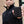Person holding a black ActionHeat power bank