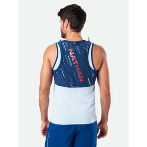 Man wearing a blue Nathan hydration vest over a light blue tank top viewed from the back