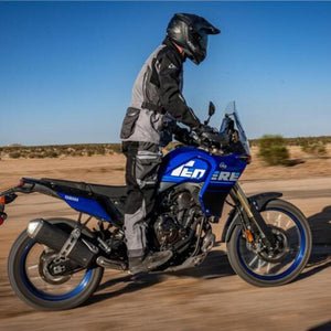 Motorcyclist wearing Tourmaster riding gear on a blue Yamaha motorcycle