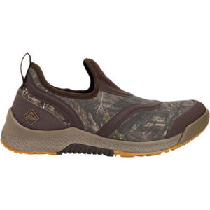 Muck camo slip on shoe with brown trim and textured tan sole