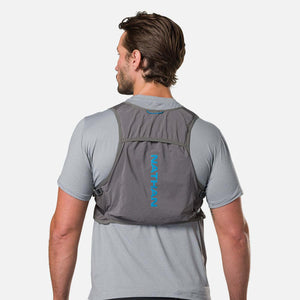 Man wearing a grey Nathan hydration vest from the back