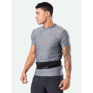 Man wearing a black Nathan running belt over a grey t-shirt