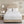 Beautyrest white quilted mattress pad on a bed
