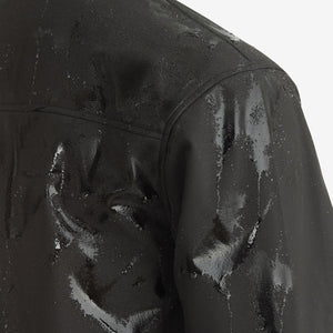 Water droplets on the shoulder of a black Venture Heat jacket