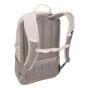 Back view of a beige Thule backpack showing padded shoulder straps and mesh back panel