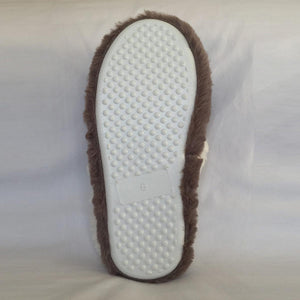 Brown slipper sole with white non-slip grip pattern and size 6 label
