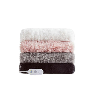 Stack of four Serta faux fur heated blankets in white pink grey and black with a controller