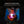 Child sitting in a blue camping chair holding a glowing BioLite AlpenGlow 250 lantern at night