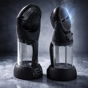 Two black portable misting fans with clear water reservoirs on a wet surface
