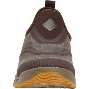 Muck camo slip on shoe with brown rubber sole and Muck logo patch