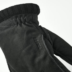 Black Hestra leather glove with ribbed cuff detail
