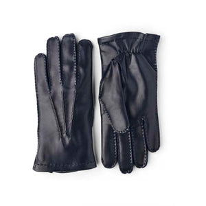 Hestra navy blue leather gloves with visible stitching