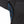 Mobile Warming black jacket with open blue zippered underarm ventilation
