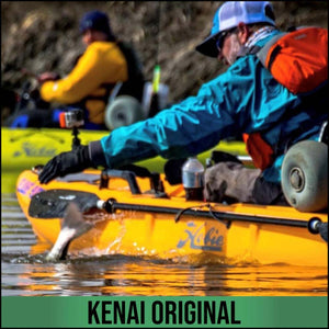 Person wearing Glacier Glove fishing gear in a yellow kayak