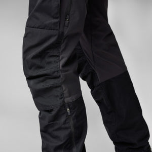 FjallRaven black trekking trousers with reinforced knee panels and zippered side vents