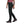 Side view of Black Diamond black hiking pants on a person wearing dark hiking shoes