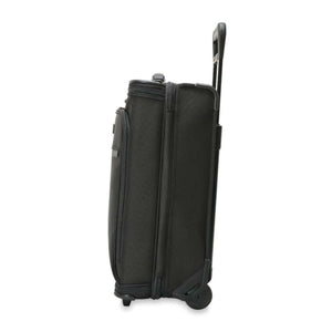 Side view of a black Briggs and Riley rolling suitcase with extended handle