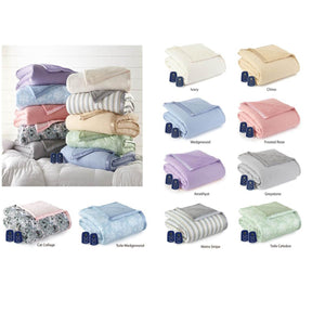 Assorted colors and patterns of electric heated blankets with remote controls