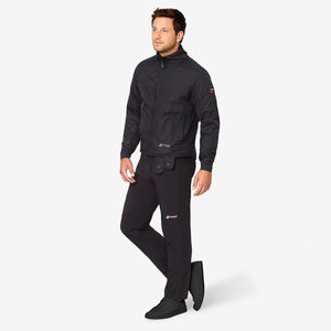 Man wearing black Venture Heat jacket and matching trousers