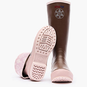 Xtratuf brown and light pink rubber boots with fish pattern lining and chevron tread soles