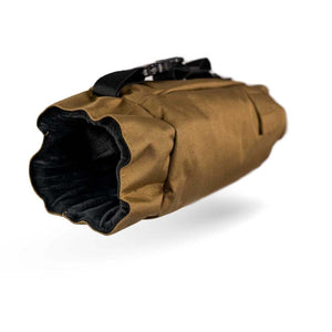 Brown tactical hand warmer muff with black interior lining and adjustable strap