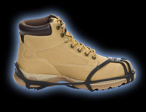 Due North traction aid attached to a tan work boot